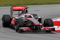 Jenson Button con el MP4-26